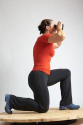 ANGELINA KNEELING POSE WITH SPYGLASS